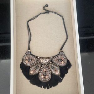 Never worn retired Stella and dot necklace with black feathers